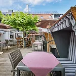 Am Kamin 3*